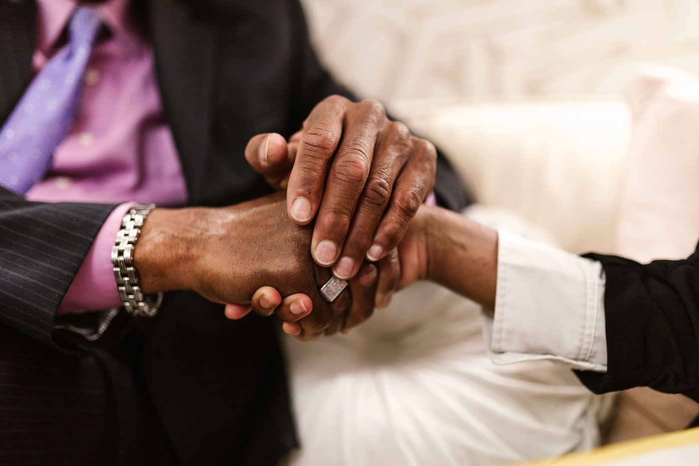 A business partner shaking hands to confirm a referral agreement